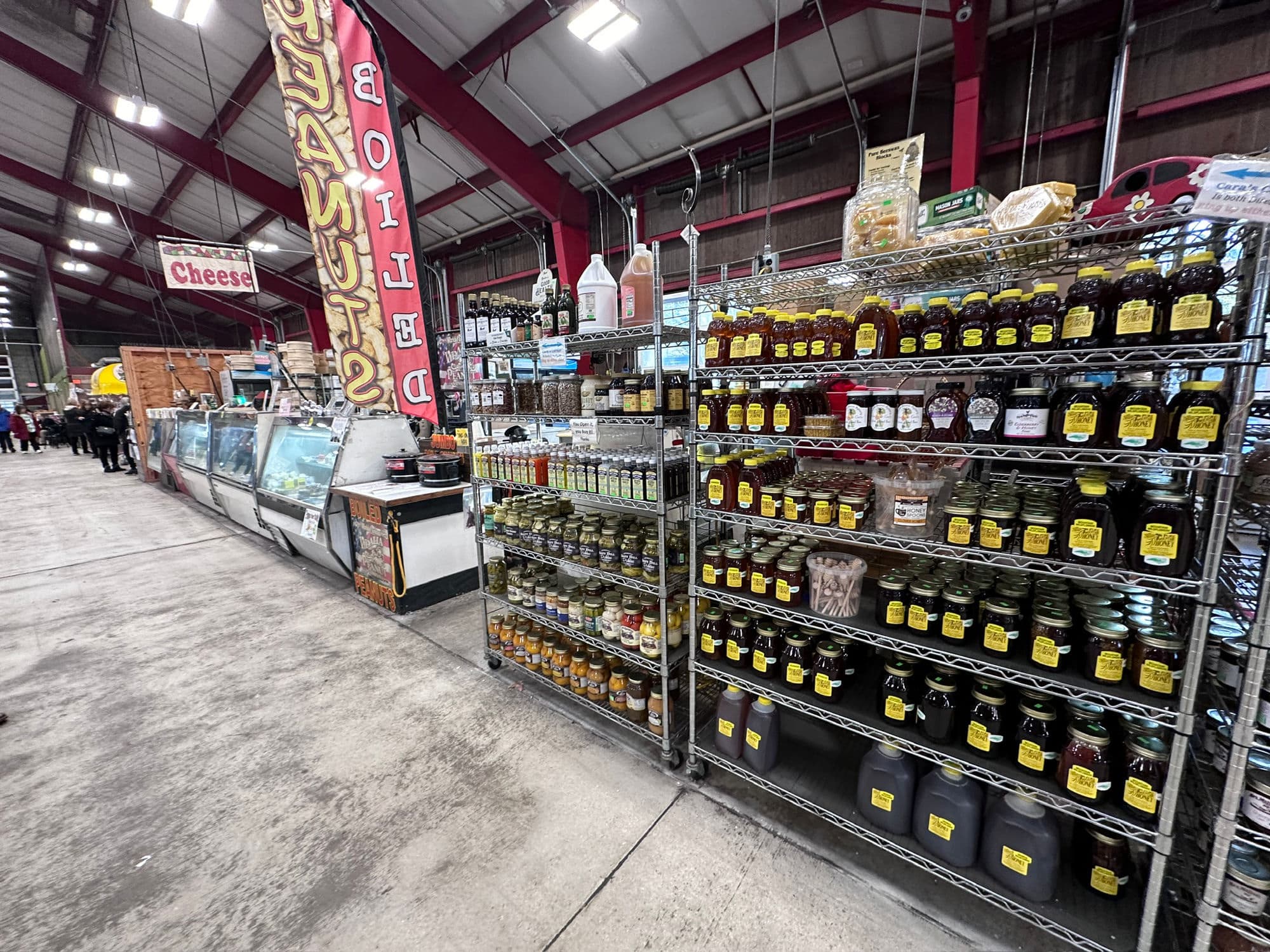 Shelves of local honey and preserves at the Western North Carolina Farmers Market
