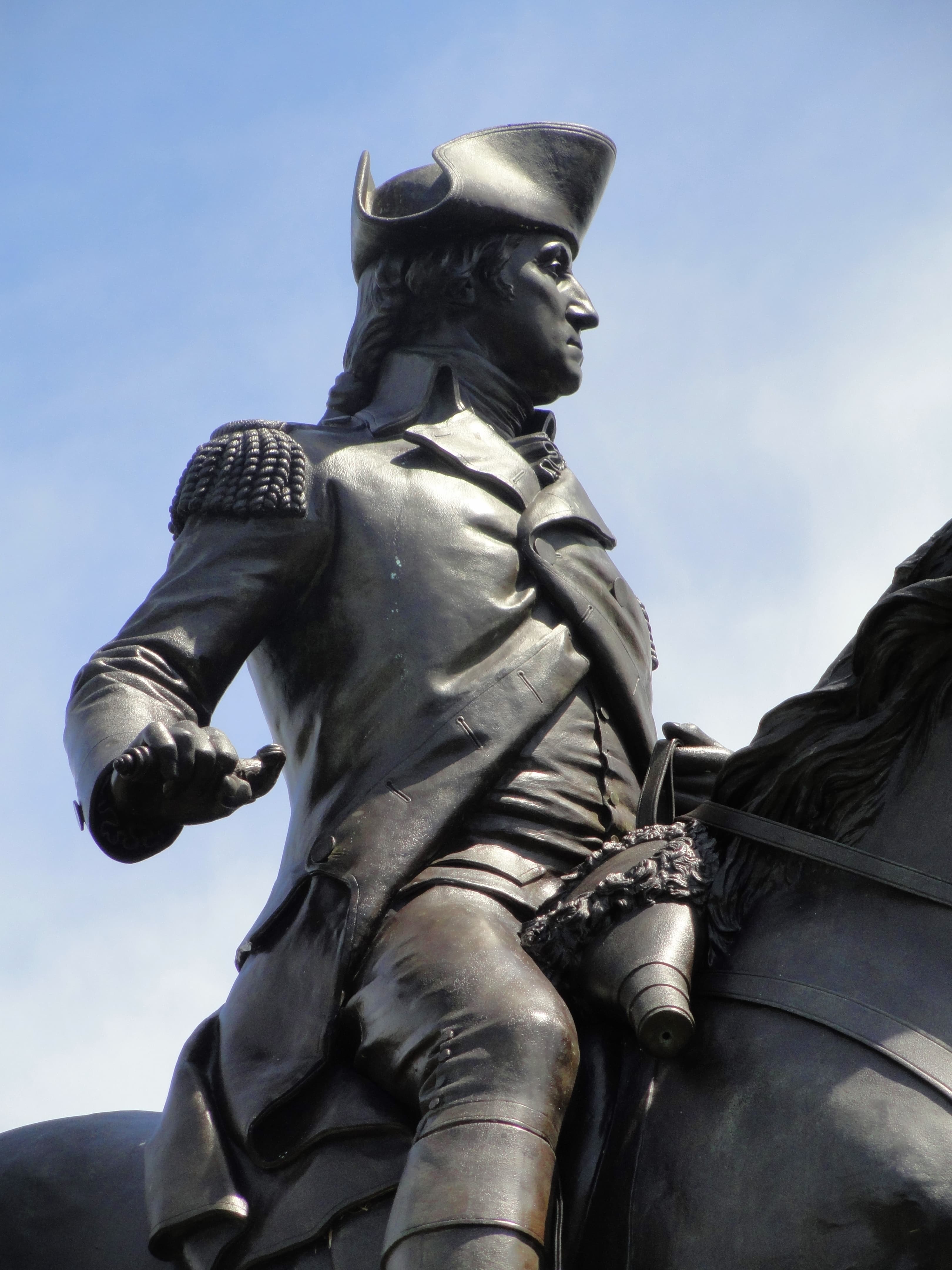 George Washington statue surrounded by trees in the Boston Public Garden