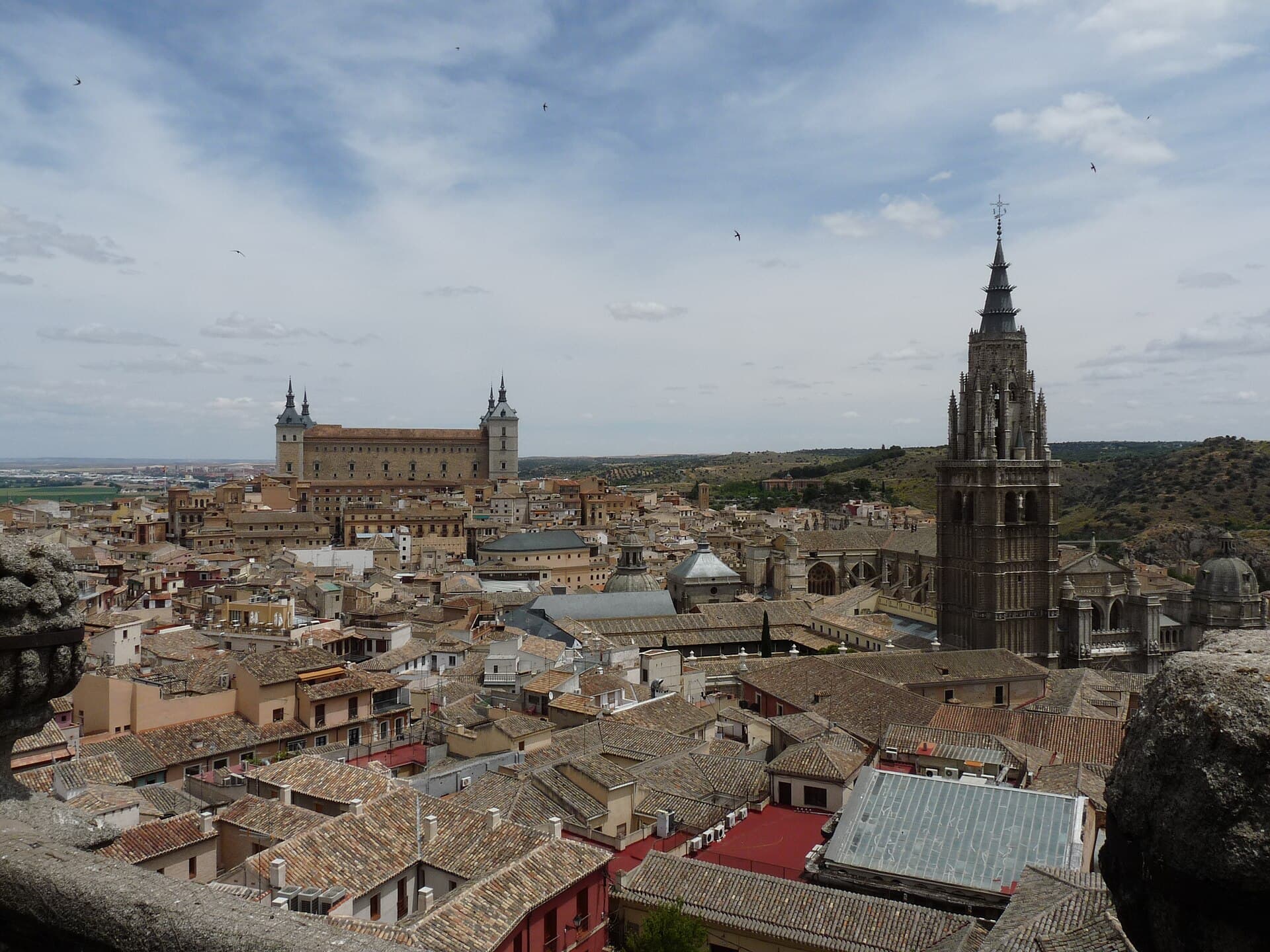 The cathedral and Alcázar rising above the historic city of Toledo